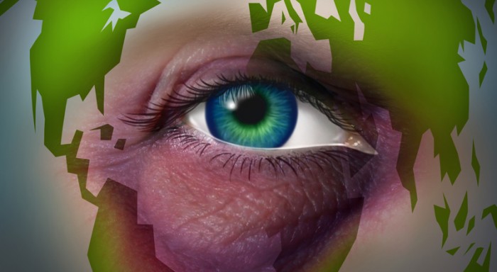 Global domestic violence and abusing mother earth concept with a violent bruised black eye on a human face with a world map as a symbol of injury to the environment and international law for the protection of women and human rights.